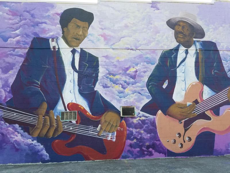 Jimi Hendrix and Johnny Jones guitar duel mural by Norf Collective on Jefferson Street, Nashville